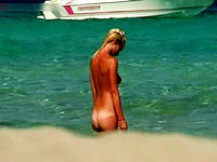 You should see this beautiful nudist mermaid that is sexily entering the blue waves of the warm ocean! Incredible view!